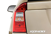 AUT 30 IZ0371 01
2009 Kia Rondo LX Champagne Brake Light Detail Studio