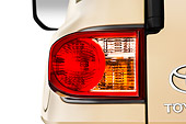 AUT 30 IZ0478 01
2013 Toyota FJ Cruiser Yellow Brake Light Detail Studio