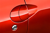 AUT 30 IZ0556 01
2009 Mitsubishi Eclipse GT Spyder Red Door Handle Detail Studio