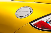 AUT 30 IZ0571 01
2009 Mitsubishi Eclipse GT Coupe Yellow Gas Door Detail Studio