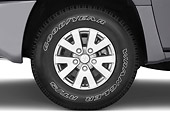 AUT 30 IZ0581 01
2008 Mitsubishi Raider Double Cab LS Pickup Truck Gray Front Wheel Detail Studio