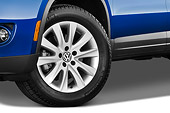 AUT 30 IZ0717 01
2010 Volkwagen Tiguan SEL Blue Front Wheel Detail Studio