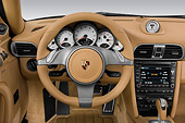 AUT 30 IZ0775 01
2010 Porsche 911 Carrera S Coupe Green Interior Detail Studio