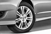 AUT 30 IZ0813 01
2010 Honda Fit Sport Silver Front Wheel Detail Studio