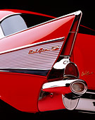 AUT 30 RK0030 03
1957 Chevrolet Bel Air Red Close Up Low Rear Tailfin Studio Background