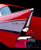 AUT 30 RK0030 04
1957 Chevrolet Bel Air Red Close Up Low Rear Tailfin Studio Background