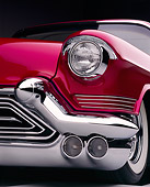 AUT 30 RK0067 06
Close Up Of 1957 Candy Raspberry Cadillac Eldorado Low Front Corner Of Headlight And Grill