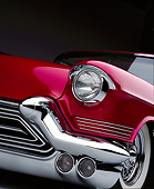 AUT 30 RK0067 14
Close Up Of 1957 Candy Raspberry Cadillac Eldorado Low Front Corner Of Headlight And Grill