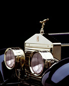 AUT 30 RK0081 13
Close Up Of A 1925 Black Rolls-Royce Ornament And Headlights Studio