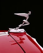 AUT 30 RK0083 03
Close Up Of An Auburn Cabriolet Hood Ornament Studio Background