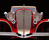 AUT 30 RK0084 03
Close Up Low Shot Of A 1932 Auburn Cabriolet Head On Grill And Headlights Studio