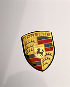 AUT 30 RK0120 03
1998 Silver Porsche Detail Of Hood Emblem