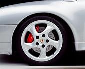 AUT 30 RK0121 07
1998 Silver Porsche Detail Of Front Wheel With Red Brake Calipers