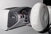 AUT 30 RK0278 05
Detail Shot Of Air Bag Deploying From Steering Wheel At SF Car Show