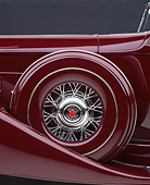 AUT 30 RK0297 07
1933 Packard Convertible  Burgundy Detail Shot Of Covered Spare Wheel  Studio