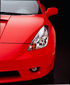 AUT 30 RK0308 02
2001 Toyota Celica Red Detail Head On Front Half Studio Headlight