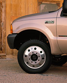 AUT 30 RK0397 02
1999 Ford F550 Flatbed Champagne Front Detail