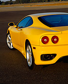 AUT 30 RK0407 02
1999 Ferrari 360 Modena Yellow Rear Side Shot On Pavement
