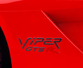 AUT 30 RK0519 01
Dodge Viper GTSR Concept Red Silver Stripe Detail Logo On Side Of Car