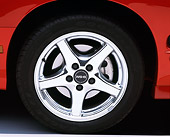 AUT 30 RK0748 01
2001 Pontiac Firebird Trans Am Sunset Orange Detial Tire Shot Studio