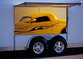 AUT 30 RK1830 01
2004 Speed Star Coupe In Trailer 3/4 Front View On Pavement