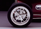 AUT 30 RK1873 01
1932 Ford Custom Roadster Burgundy Profile Detail Of Front Wheel Studio