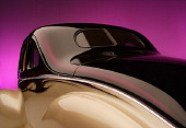 AUT 30 RK2284 01
1940 Ford Deluxe Opera Coupe Champagne & Purple Detail 3/4 Rear Studio