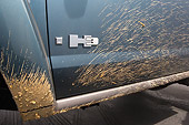 AUT 30 RK3069 02
2006 Hummer H3 Emblem Detail With Mud