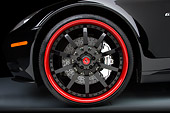 AUT 30 RK4309 01
2008 Ferrari 612 Scaglietti Sessanta Black And Maroon Front Wheel Detail Studio