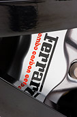 AUT 30 RK4311 01
2008 Ferrari 612 Scaglietti Sessanta Black And Maroon Front Wheel Detail Studio