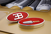 AUT 30 RK4422 01
2008 Bugatti Veyron 16.4 Grand Sport Roadster Gold And White Emblem Detail Studio