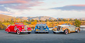 AUT 31 RK0111 01
1936 Chevrolet Roadster Red, 1936 Packard 120 Convertible Blue And 1936 Auburn Speedster Tan And Brown On Gravel By Lake