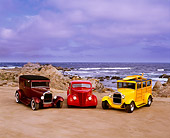 AUT 31 RK0013 02
1929 Ford Woody and Sedan Delivery 1937 3-Window Coupe On Sand At Beach