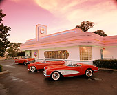 AUT 31 RK0014 01
1960 Corvette 1956 T-Bird And 1957 Chevy Bel Air On Pavement In Front Of Diner Red Sky