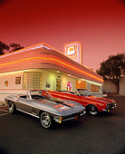 AUT 31 RK0016 01
1967 Corvette 427 And 1967 Plymouth Belvedere GTX 426 Hemi In Front Of Diner Red Sky