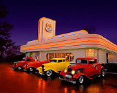 AUT 31 RK0017 27
1935 Ford Coupe Red 1932 Ford Roadster Peach 1932 Ford Coupe Yellow 1932 Ford Coupe Razberry In Front Of Diner Route 66