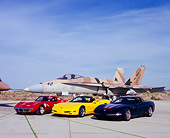 AUT 31 RK0051 05
1970 2001 2004 Chevy Corvette Cars By Jet Fighter Airplane
