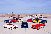 AUT 31 RK0053 07
Chevrolet Corvettes With Two Jet Fighters Blue Sky