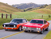 AUT 31 RK0091 01
1969 Chevrolet Camaro And 1968 Chevelle 3/4 Front View On Road By Hills