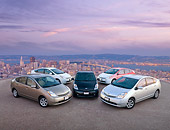 AUT 31 RK0101 01
2006 And 2007 Toyota Priuses On Pavement By City