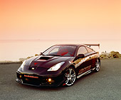 AUT 33 RK0302 02
2000 Toyota Celica GT Black With Graphics 3/4 Front View On Pavement Water Background Filtered