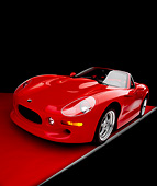 AUT 33 RK0305 19
2000 Shelby Series One Red Convertible Wide Angle 3/4 Front View On Red Floor Gray Line Studio