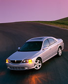 AUT 33 RK0011 06
2000 Lincoln LS Sport Sedan Silver 3/4 Front View On Pavement Hill Filtered
