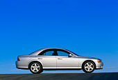 AUT 33 RK0019 07
2000 Lincoln LS Sport Sedan Silver Low Profile View On Pavement Blue Sky