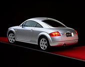 AUT 33 RK0067 01
2000 Audi Quattro TT Coupe Silver 3/4 Rear View On Red Floor Gray Line Studio