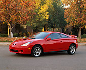 AUT 33 RK0085 05
2000 Toyota Celica Red 3/4 Side View On Pavement By Fall Colored Trees