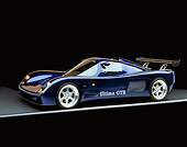 AUT 33 RK0109 03
2000 Ultima GTR Blue 3/4 Side View On Gray Line Studio