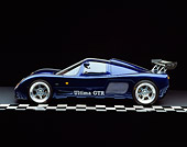 AUT 33 RK0110 02
2000 Ultima GTR Blue Profile View On Checkered Line Studio