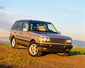 AUT 33 RK0134 01
2000 Range Rover Gold Side View On Pavement Hills