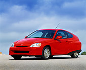AUT 33 RK0166 02
2000 Honda Insight Hybrid Red 3/4 Side View On Pavement